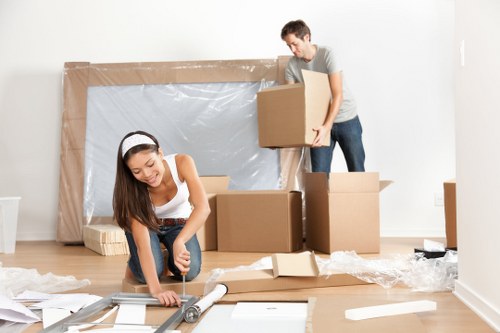 Office relocation planning in Uxbridge with moving boxes and workspace setup