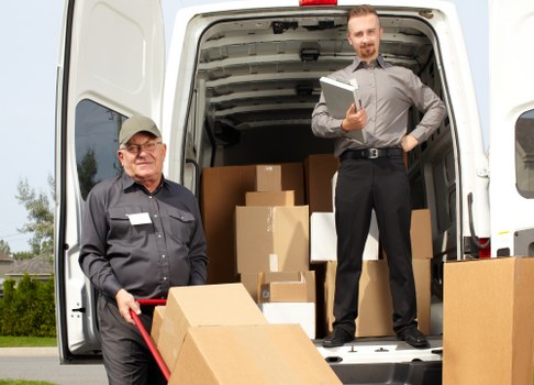 Professional flat removals in Uxbridge with moving van and boxes