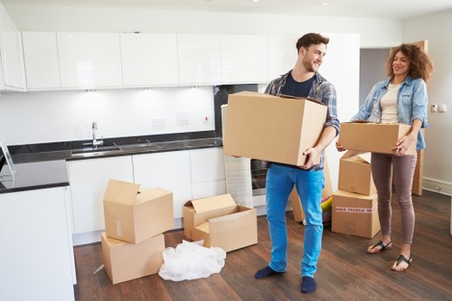 Organised storage space in Uxbridge with boxes and furniture